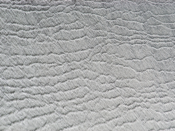 Wellenmuster im Sand, aus der Luft fotografiert